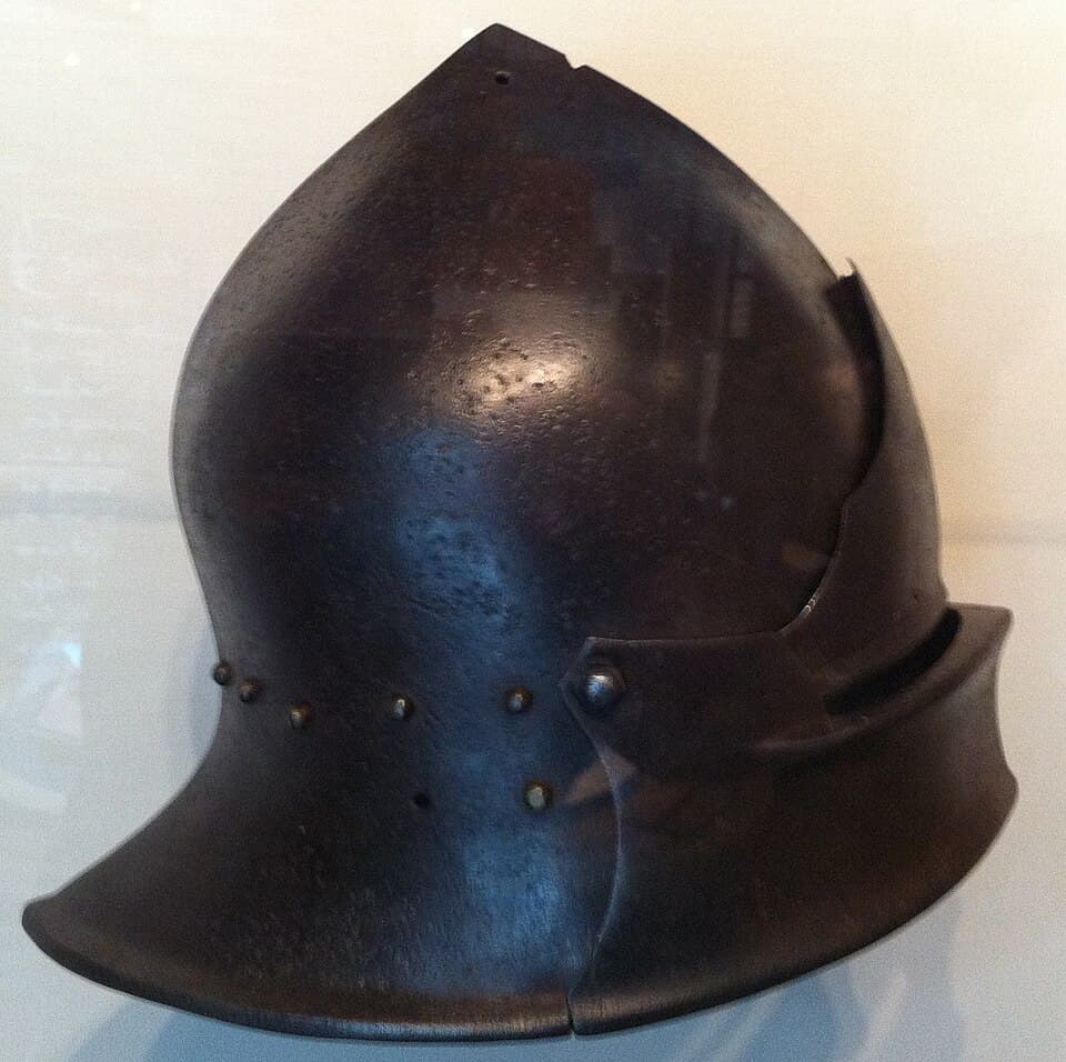 A sallet: a steel helmet with a long brim at the back, shown alone.